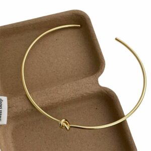 Torque gaulois doré ouvert avec nœud central